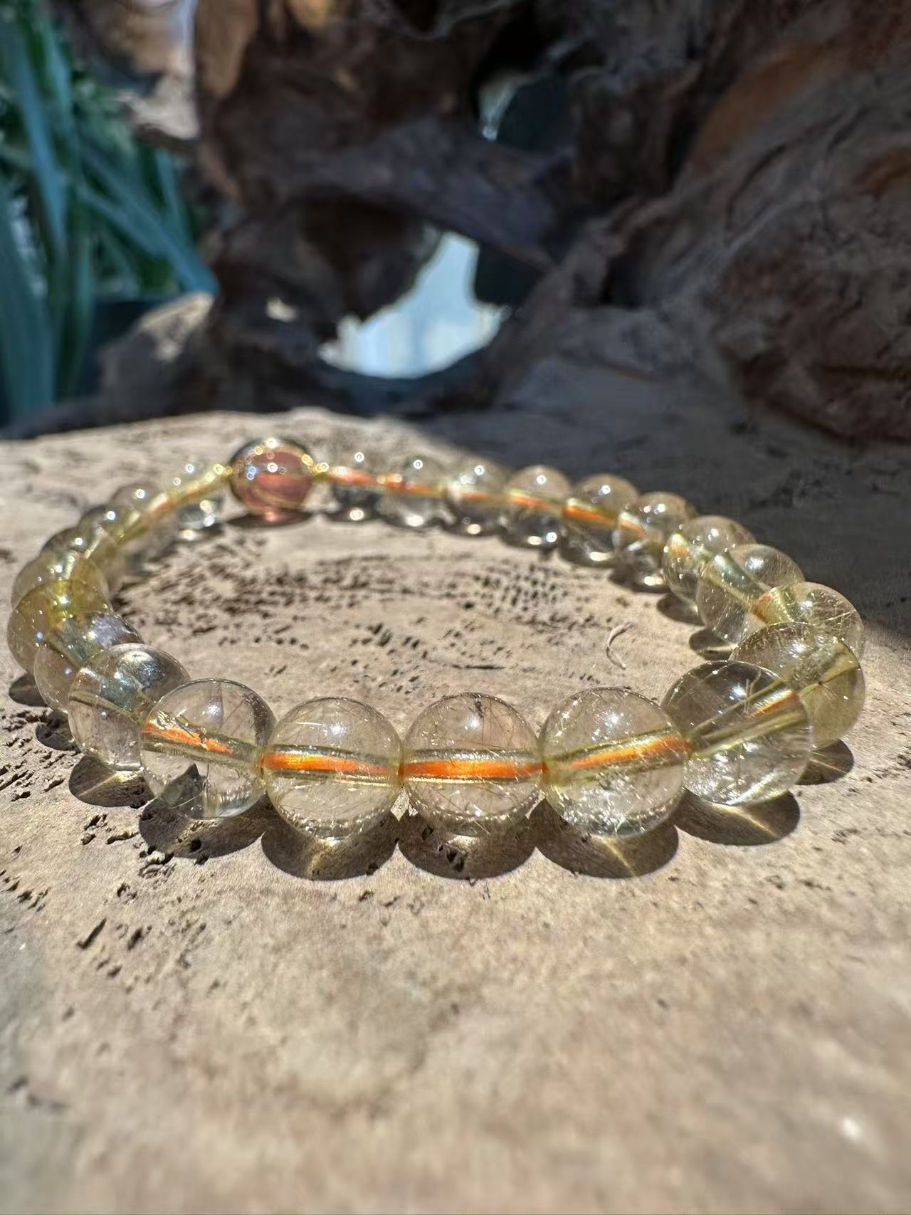 Natural Rutilated Quartz Bracelet with Red Hematite Inclusion Sphere
