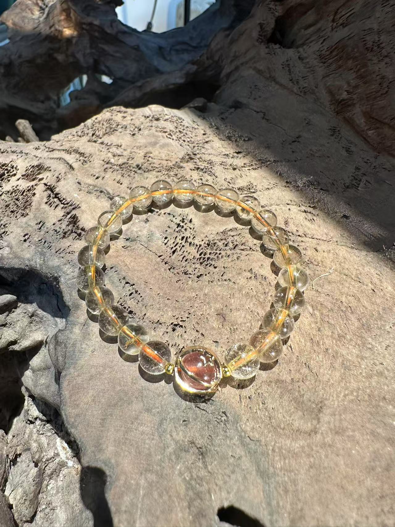 Natural Rutilated Quartz Bracelet with Red Hematite Inclusion Sphere